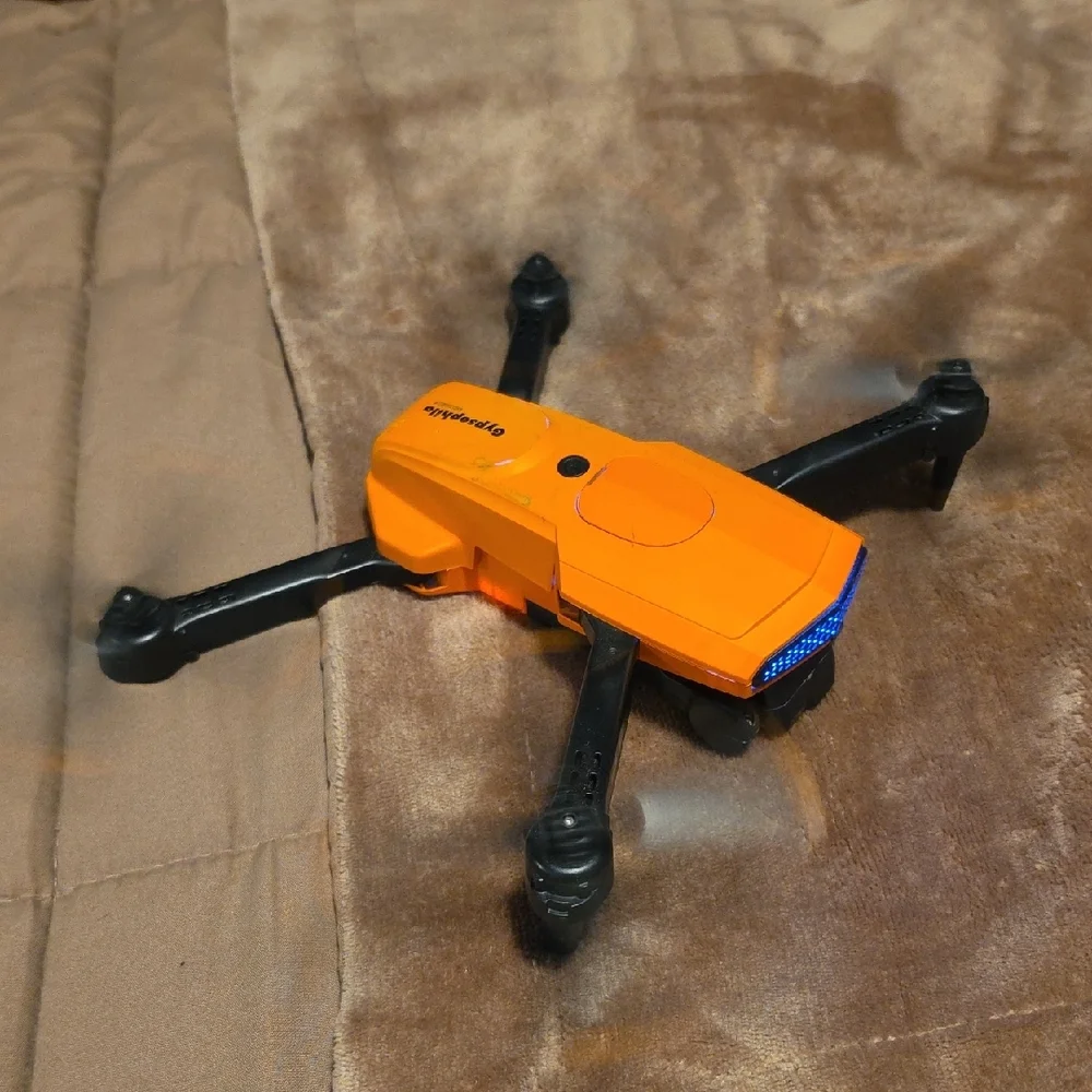 Orange Compact Foldable Drone with Remote Controller